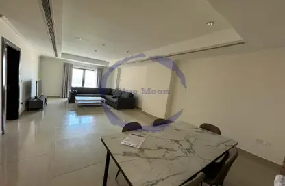 Living / Dining Room image for: Apartment - 1 Bedroom - 2 Bathrooms for rent in East Porto Drive - Porto Arabia - The Pearl Island - Doha, Image 1
