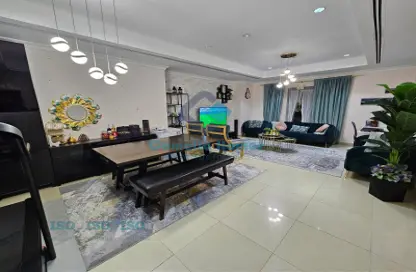 Living Room image for: Apartment - 1 Bedroom - 2 Bathrooms for sale in East Porto Drive - Porto Arabia - The Pearl Island - Doha, Image 1