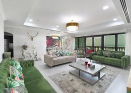 صورةغرفة المعيشة لـ: شقة - 2 غرف نوم - 3 حمامات للبيع في طريق بورتو الشرقي - بورتو أرابيا - جزيرة اللؤلؤة - الدوحة, صورة 1