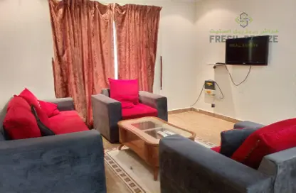 Living Room image for: Apartment - 2 Bedrooms - 2 Bathrooms for rent in Al Mansoura - Doha, Image 1
