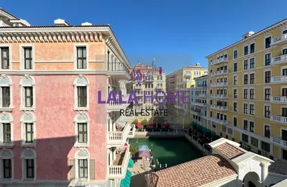 Outdoor Building image for: Apartment - 2 Bedrooms - 3 Bathrooms for rent in Chateau - Qanat Quartier - The Pearl Island - Doha, Image 1