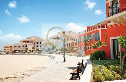 Outdoor Building image for: Townhouse - 4 Bedrooms - 4 Bathrooms for sale in Qanat Quartier - The Pearl Island - Doha, Image 1
