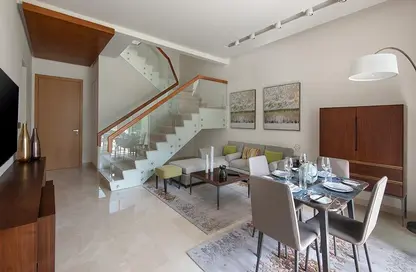 Living / Dining Room image for: Apartment - 2 Bedrooms - 3 Bathrooms for rent in Banyan Tree Doha - Musheireb - Doha, Image 1