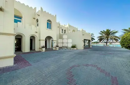 Outdoor Building image for: Villa - 6 Bedrooms - 5 Bathrooms for rent in West Gate - West Bay Lagoon - Doha, Image 1
