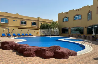 Pool image for: Villa - 4 Bedrooms - 4 Bathrooms for rent in Wholesale Market Street - Abu Hamour - Doha, Image 1