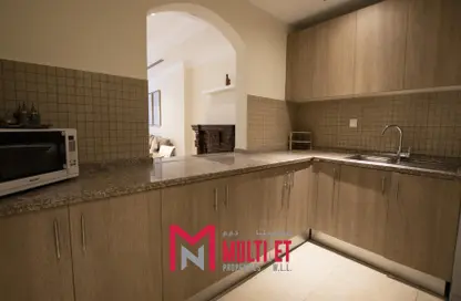 Kitchen image for: Apartment - 1 Bedroom - 2 Bathrooms for sale in Tower 28 - Porto Arabia - The Pearl Island - Doha, Image 1
