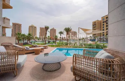 Pool image for: Townhouse - 3 Bedrooms - 4 Bathrooms for rent in The Pearl Island - Doha, Image 1