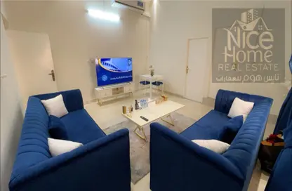 صورة لـ غرفة المعيشة شقة - 1 حمام للايجار في عين خالد - عين خالد - الدوحة ، صورة رقم 1