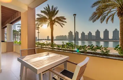 Terrace image for: Apartment - 1 Bedroom - 2 Bathrooms for rent in Viva West - Viva Bahriyah - The Pearl Island - Doha, Image 1