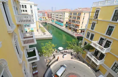 Outdoor Building image for: Apartment - 5 Bedrooms - 5 Bathrooms for sale in Carnaval - Qanat Quartier - The Pearl Island - Doha, Image 1