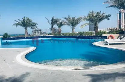 Pool image for: Apartment - 1 Bedroom - 2 Bathrooms for rent in Burj Al Marina - Marina District - Lusail, Image 1