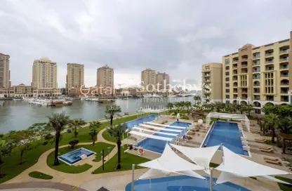 Pool image for: Apartment - 1 Bedroom - 2 Bathrooms for rent in The St. Regis Marsa Arabia Island - Marsa Arabia - The Pearl Island - Doha, Image 1