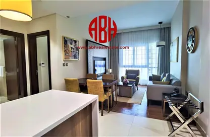 Living / Dining Room image for: Apartment - 2 Bedrooms - 2 Bathrooms for rent in Al Jassim Tower - C-Ring Road - Al Sadd - Doha, Image 1