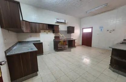 Staff Accommodation - Studio - 6 Bathrooms for rent in Ain Khaled - Ain Khaled - Doha