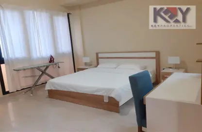 Room / Bedroom image for: Apartment - 1 Bedroom - 2 Bathrooms for rent in Rawdat Al Khail - Rawdat Al Khail - Doha, Image 1