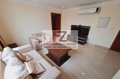 Living Room image for: Apartment - 1 Bedroom - 1 Bathroom for rent in Al Thani Commercial building - Musheireb - Musheireb - Doha, Image 1