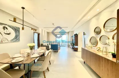 Living / Dining Room image for: Apartment - 2 Bedrooms - 3 Bathrooms for rent in Marina District - Lusail, Image 1