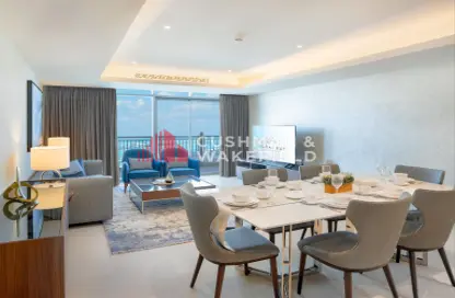 Living / Dining Room image for: Apartment - 2 Bedrooms - 2 Bathrooms for rent in Abraj Bay - Abraj Quartiers - The Pearl Island - Doha, Image 1