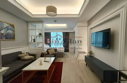 صورة لـ غرفة المعيشة شقة - 1 حمام للايجار في ابراج بن الشيخ - المرقاب الجديد - الدوحة ، صورة رقم 1