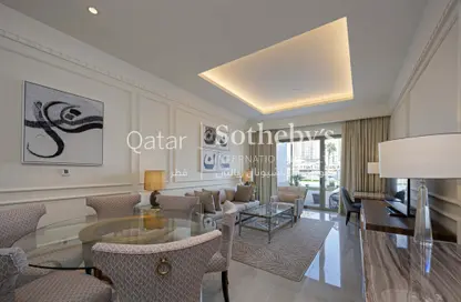 Living / Dining Room image for: Townhouse - 2 Bedrooms - 3 Bathrooms for rent in The St. Regis Marsa Arabia Island - Marsa Arabia - The Pearl Island - Doha, Image 1