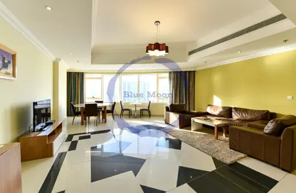 Living / Dining Room image for: Apartment - 3 Bedrooms - 3 Bathrooms for rent in Burj Doha - West Bay - West Bay - Doha, Image 1