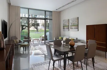 Living / Dining Room image for: Apartment - 2 Bedrooms - 2 Bathrooms for rent in Banyan Tree Doha - Musheireb - Doha, Image 1