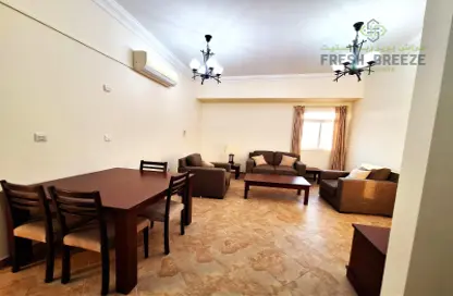 Living / Dining Room image for: Apartment - 2 Bedrooms - 2 Bathrooms for rent in Al Sadd - Doha, Image 1