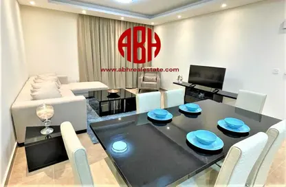 Living / Dining Room image for: Apartment - 2 Bedrooms - 3 Bathrooms for rent in Boardwalk - Boardwalk - Qatar Entertainment City - Lusail, Image 1