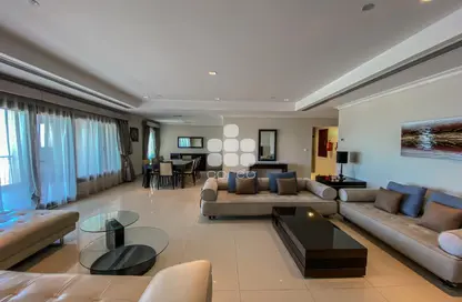 Living / Dining Room image for: Apartment - 2 Bedrooms - 3 Bathrooms for rent in East Porto Drive - Porto Arabia - The Pearl Island - Doha, Image 1