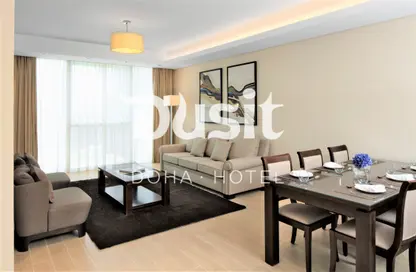 Living / Dining Room image for: Apartment - 1 Bedroom - 2 Bathrooms for rent in Dusit Doha Hotel - Diplomatic Street - West Bay - Doha, Image 1