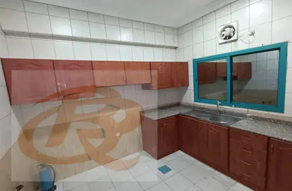 Kitchen image for: Apartment - 2 Bedrooms - 2 Bathrooms for rent in Al Khazin Street - Madinat Khalifa South - Madinat Khalifa - Doha, Image 1