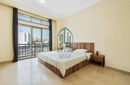 Room / Bedroom image for: Apartment - 1 Bedroom - 2 Bathrooms for rent in Umm Ghwailina Comm - Umm Ghuwalina - Umm Ghuwailina - Doha, Image 1