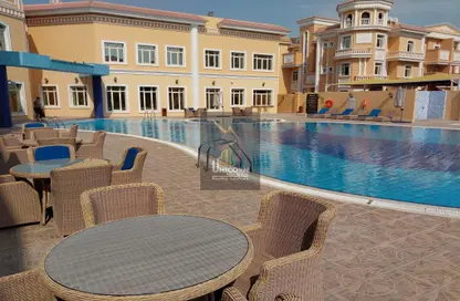 Pool image for: Villa - 4 Bedrooms - 5 Bathrooms for rent in Bu Hamour Street - Abu Hamour - Doha, Image 1