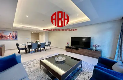 Living / Dining Room image for: Apartment - 2 Bedrooms - 3 Bathrooms for rent in Abraj Bay - Abraj Quartiers - The Pearl Island - Doha, Image 1