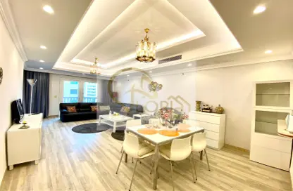 Living / Dining Room image for: Apartment - 2 Bedrooms - 3 Bathrooms for sale in West Porto Drive - Porto Arabia - The Pearl Island - Doha, Image 1
