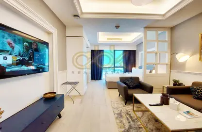 Living Room image for: Apartment - 1 Bathroom for sale in Al Sadd Road - Al Sadd - Doha, Image 1