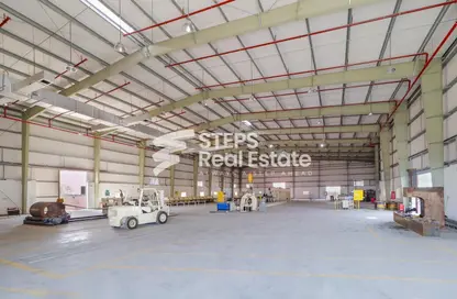 Parking image for: Warehouse - Studio for sale in Industrial Area 4 - Industrial Area - Industrial Area - Doha, Image 1