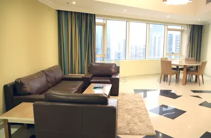 Living / Dining Room image for: Apartment - 2 Bedrooms - 2 Bathrooms for rent in City Center Towers - West Bay - Doha, Image 1
