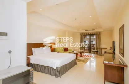 Room / Bedroom image for: Apartment - 1 Bathroom for rent in West Porto Drive - Porto Arabia - The Pearl Island - Doha, Image 1