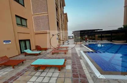 Pool image for: Apartment - 1 Bedroom - 2 Bathrooms for rent in Tower 28 - Porto Arabia - The Pearl Island - Doha, Image 1