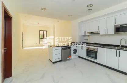 Kitchen image for: Apartment - 1 Bedroom - 2 Bathrooms for sale in Lusail City - Lusail, Image 1
