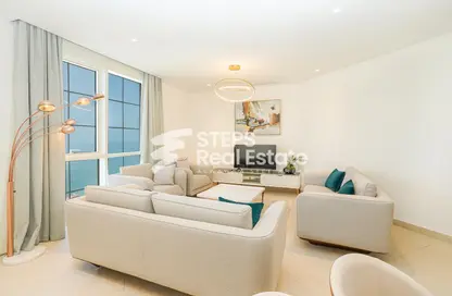 Living Room image for: Apartment - 1 Bedroom - 2 Bathrooms for rent in Floresta Gardens - Floresta Gardens - The Pearl Island - Doha, Image 1