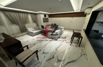 Living / Dining Room image for: Apartment - 2 Bedrooms - 2 Bathrooms for rent in Thabit Bin Zaid Street - Al Mansoura - Doha, Image 1