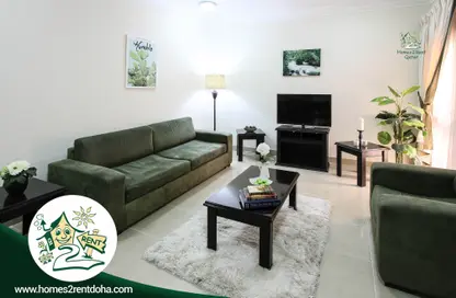 Living Room image for: Apartment - 1 Bedroom - 1 Bathroom for rent in Omar Bin Abdul Aziz Street - Madinat Khalifa - Doha, Image 1