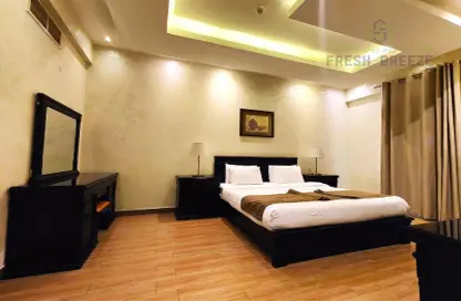 Room / Bedroom image for: Apartment - 1 Bedroom - 1 Bathroom for rent in Al Sadd - Doha, Image 1