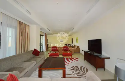 Living Room image for: Apartment - 3 Bedrooms - 4 Bathrooms for rent in East Porto Drive - Porto Arabia - The Pearl Island - Doha, Image 1