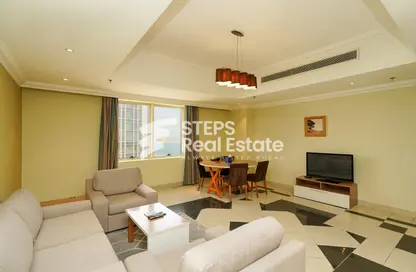 Living / Dining Room image for: Apartment - 2 Bedrooms - 3 Bathrooms for rent in Al Shatt Street - West Bay - Doha, Image 1