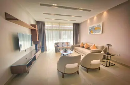 صورة لـ غرفة المعيشة مجمع سكني - 2 غرف نوم - 3 حمامات للايجار في المسيلة - المسيلة - الدوحة ، صورة رقم 1