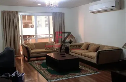 Living Room image for: Apartment - 1 Bedroom - 2 Bathrooms for rent in NBK Commercial Building - Fereej Abdel Aziz - Doha, Image 1