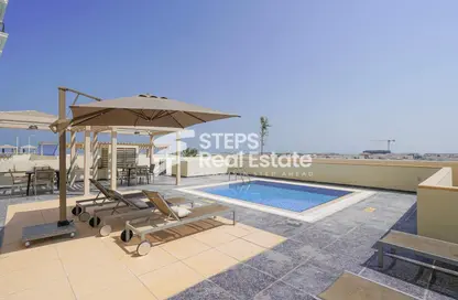 Pool image for: Apartment - 2 Bedrooms - 3 Bathrooms for rent in Floresta Gardens - Floresta Gardens - The Pearl Island - Doha, Image 1